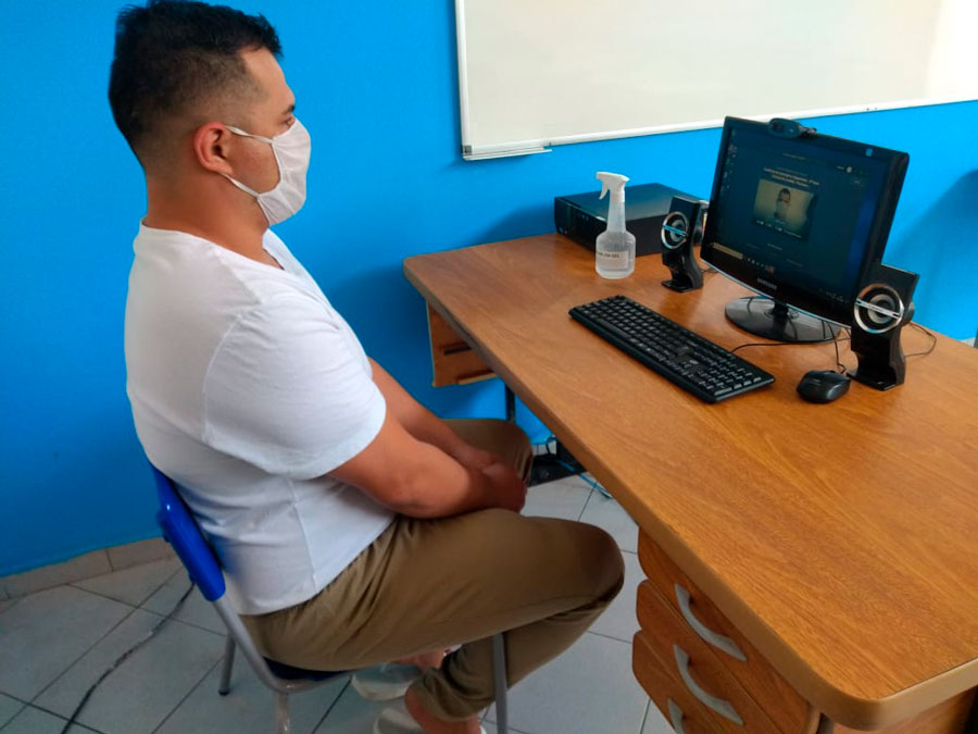 Inmate having a teleconference call, Brazil