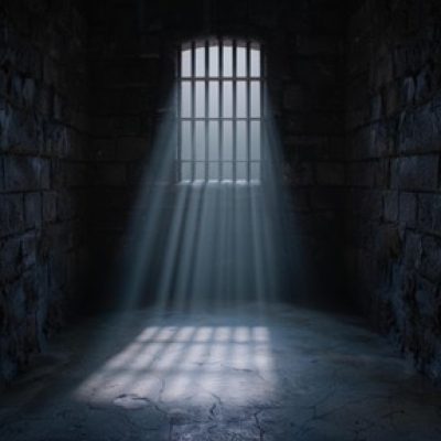 “Dramatic light shining through prison cell window” (rays of hope), downloaded from Vecteezy